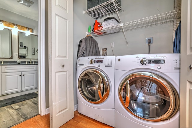 685 Quinnipiac Ave Unit 685, New Haven, CT 06513 - washroom with separate washer and dryer and light wood finished floors