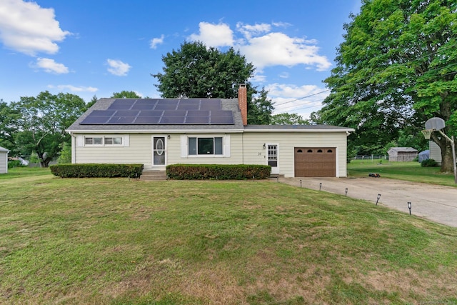 24 Claudia Ave, Brooklyn, CT 06234 - ranch-style house with driveway, an attached garage, entry steps, roof mounted solar panels, and a chimney