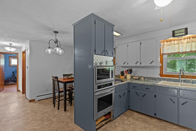 24 Claudia Ave, Brooklyn, CT 06234 - kitchen with stainless steel appliances, backsplash, a ceiling fan, and gray cabinetry