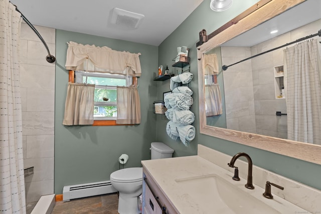 24 Claudia Ave, Brooklyn, CT 06234 - bathroom with a baseboard radiator, vanity, a tile shower, and stone finish flooring