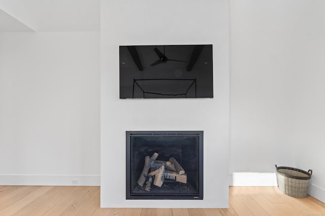 22 Serene Way, Newtown, CT 06470 - detailed view of wood finished floors and a fireplace
