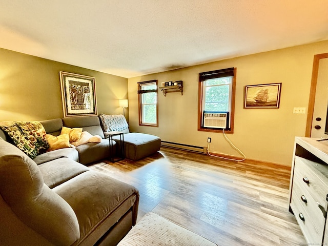 21 Pigeon Swamp Rd, Lebanon, CT 06249 - living area with a baseboard radiator, light wood finished floors, and cooling unit