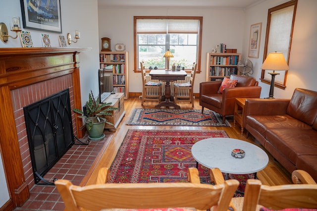 65 Willard St, Hamden, CT 06518 - living area with wood finished floors, a fireplace, and ornamental molding