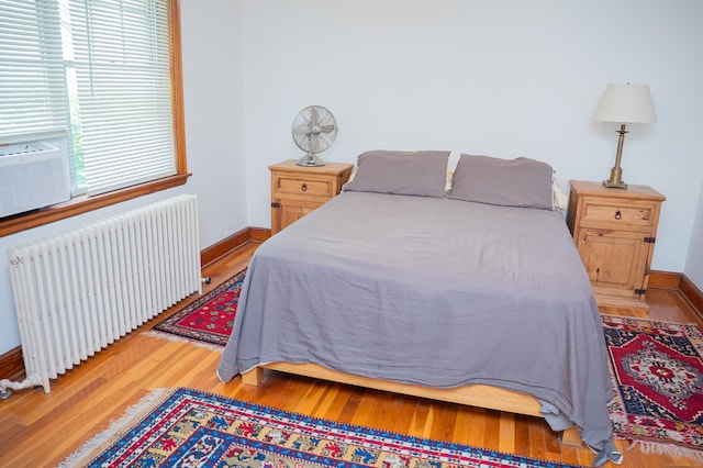 65 Willard St, Hamden, CT 06518 - bedroom featuring radiator and light wood-type flooring