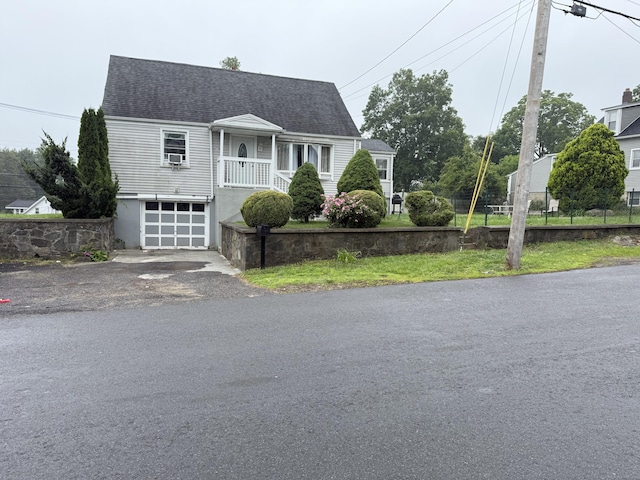 15 Edwards St, Bridgeport, CT 06606 - new england style home with a garage, a shingled roof, and driveway