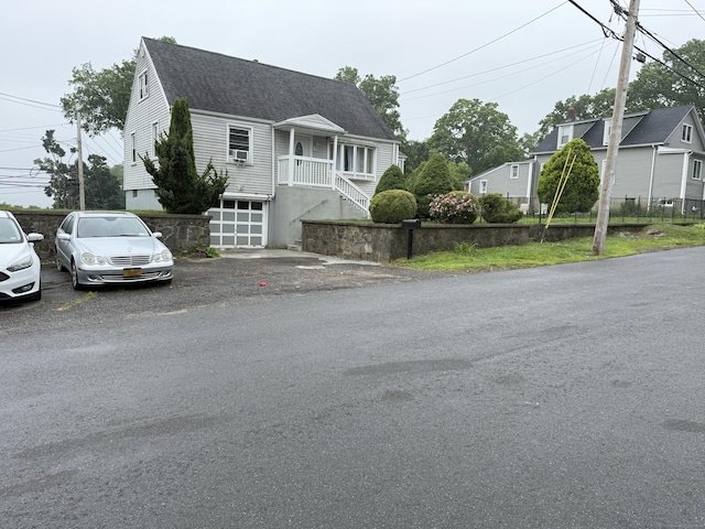 15 Edwards St, Bridgeport, CT 06606 - view of front of house with a shingled roof and stairs