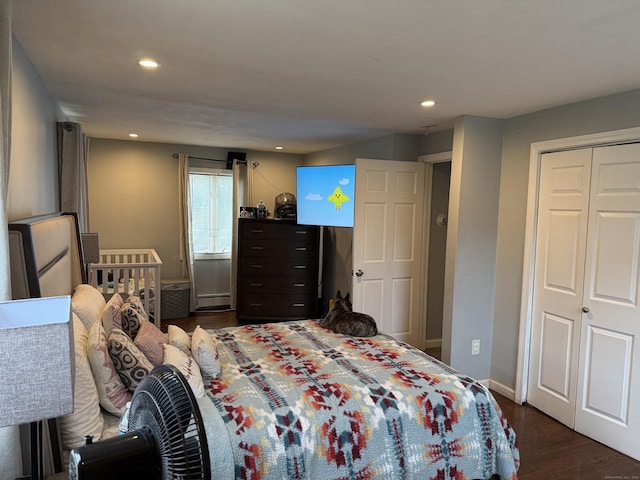 15 Edwards St, Bridgeport, CT 06606 - bedroom with a baseboard heating unit, dark wood-style flooring, and recessed lighting