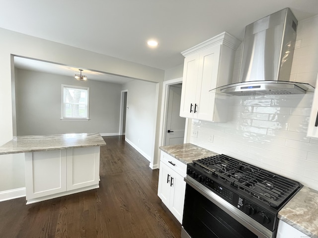63 Barraclough Ave, Hamden, CT 06517 - kitchen with wall chimney exhaust hood, black gas range oven, light stone countertops, decorative backsplash, and recessed lighting