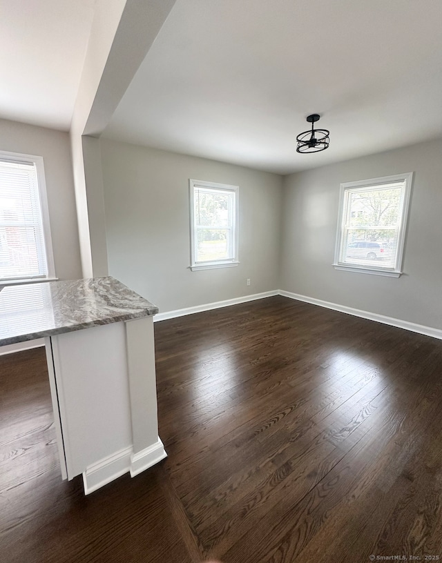 63 Barraclough Ave, Hamden, CT 06517 - spare room featuring baseboards and dark wood finished floors
