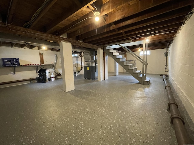 63 Barraclough Ave, Hamden, CT 06517 - unfinished below grade area featuring stairs and heating unit