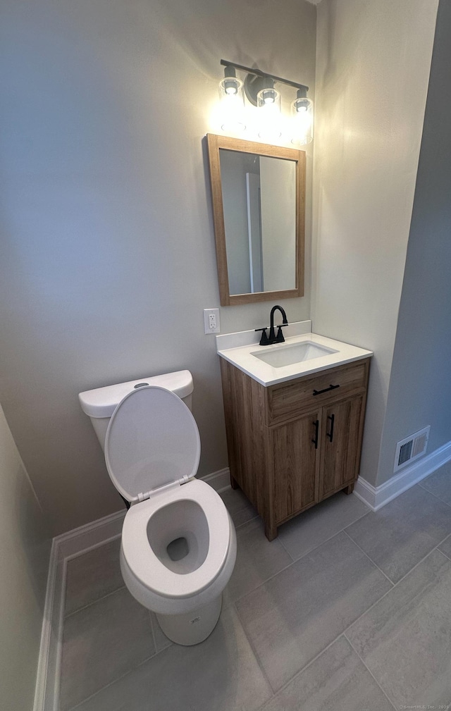 63 Barraclough Ave, Hamden, CT 06517 - half bathroom with vanity and tile patterned floors