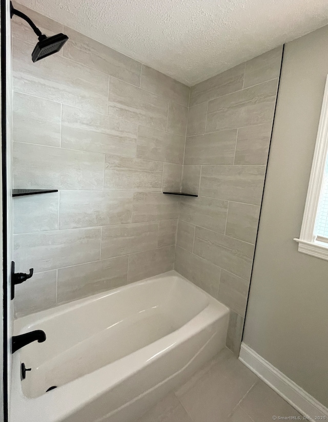 63 Barraclough Ave, Hamden, CT 06517 - full bath with a textured ceiling, tile patterned floors, and shower / washtub combination