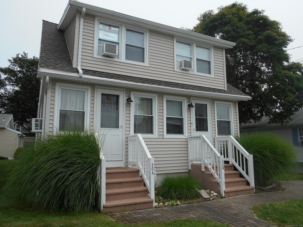 30 Hartford Ave Unit B, Old Lyme, CT 06371 - view of front facade featuring a shingled roof, entry steps, and cooling unit