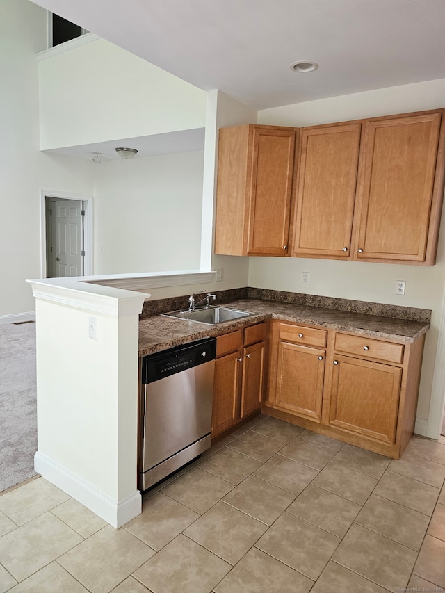 6 Haskins Rd Unit 6, Windsor, CT 06095 - kitchen featuring stainless steel dishwasher, dark countertops, light tile patterned floors, a peninsula, and brown cabinets