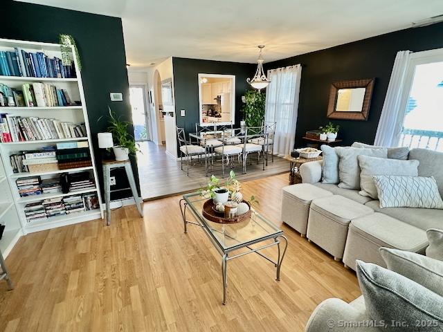 2390 State St Apt 7J, Hamden, CT 06517 - living room with wood finished floors