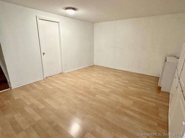 2390 State St Apt 7J, Hamden, CT 06517 - unfurnished bedroom with light wood-style floors