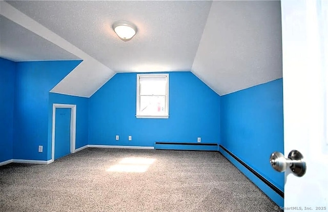 40 Mark St, Bristol, CT 06010 - bonus room featuring carpet, a baseboard radiator, and vaulted ceiling