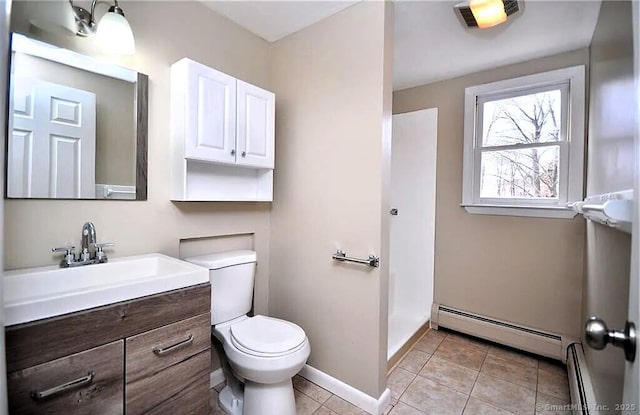 40 Mark St, Bristol, CT 06010 - bathroom featuring a baseboard radiator, vanity, and tile patterned floors