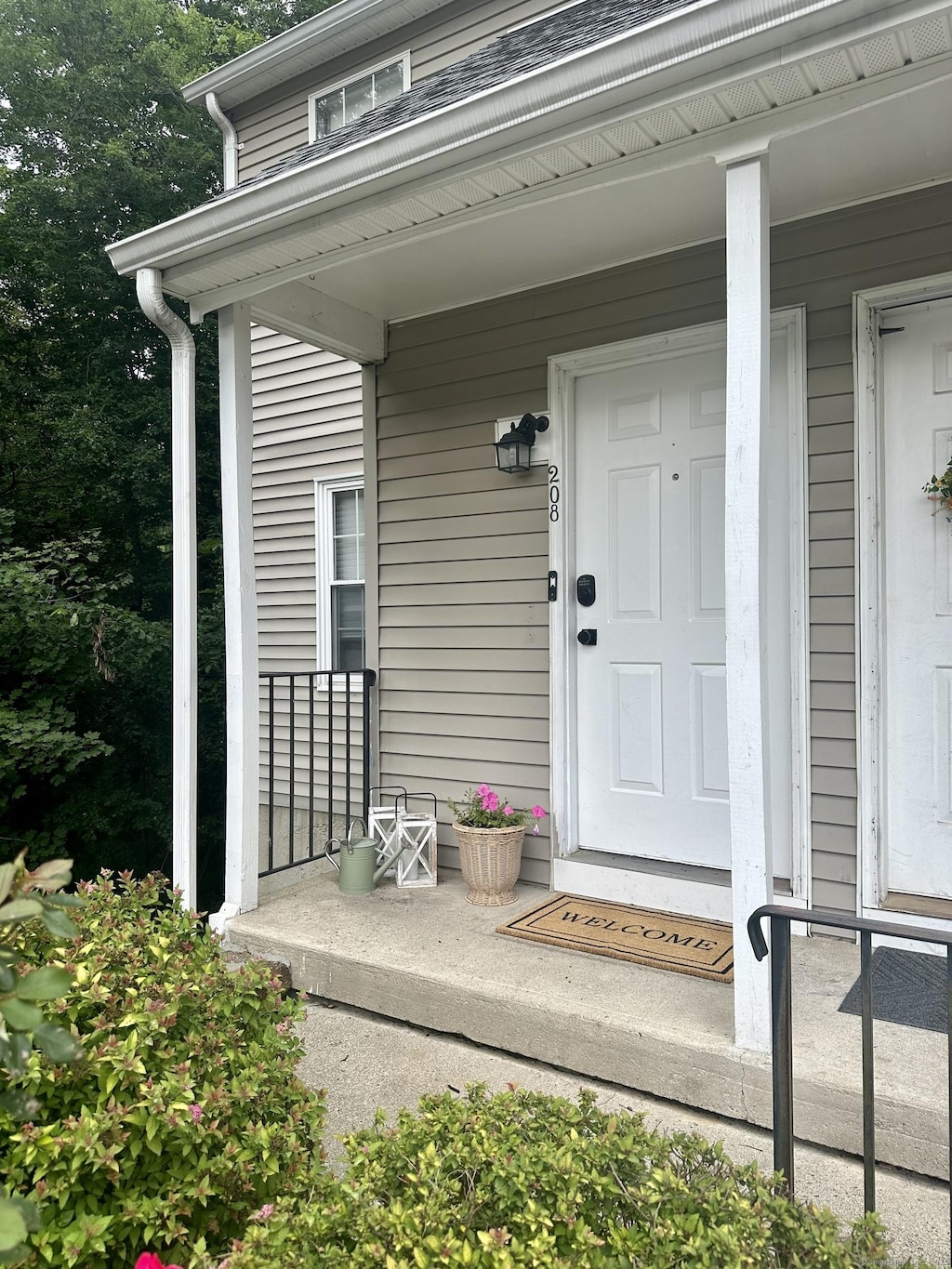 229 Branford Rd Unit 208, North Branford, CT 06471 - view of exterior entry with a porch