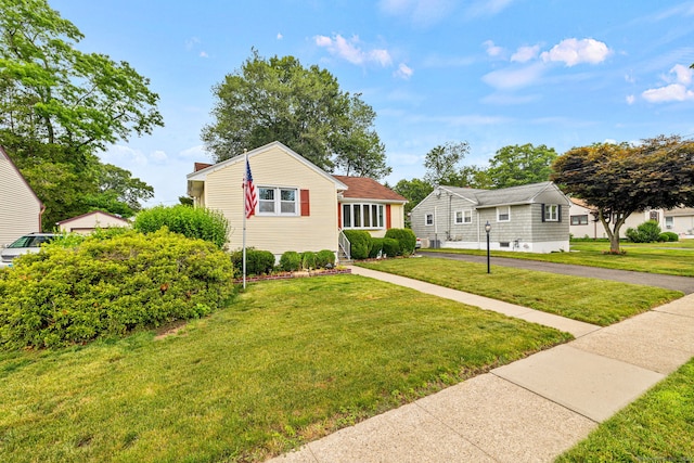 128 Auburn St, Stratford, CT 06614 - view of front of property featuring a front lawn