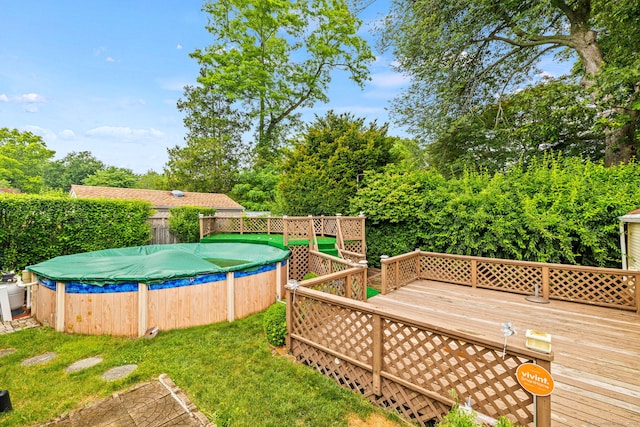 128 Auburn St, Stratford, CT 06614 - view of yard featuring a wooden deck and view of scattered trees