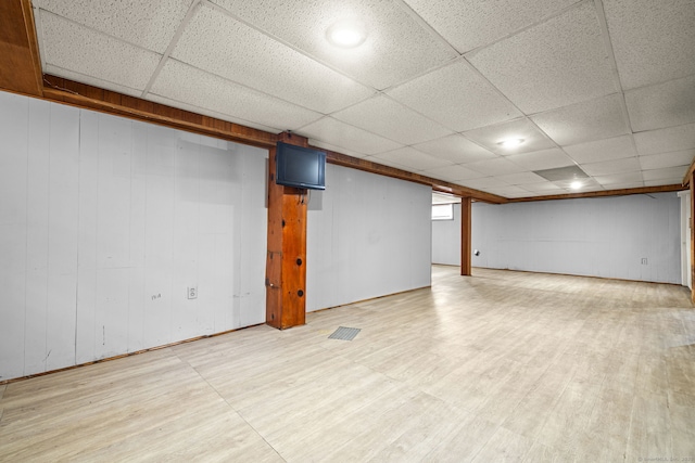 128 Auburn St, Stratford, CT 06614 - finished basement with a paneled ceiling and light wood-type flooring