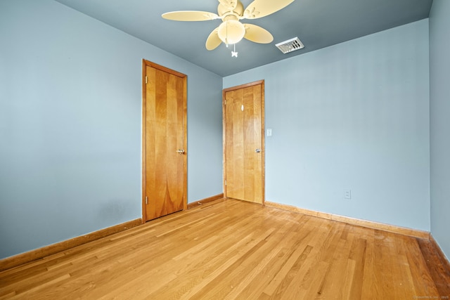 128 Auburn St, Stratford, CT 06614 - spare room featuring wood finished floors and ceiling fan