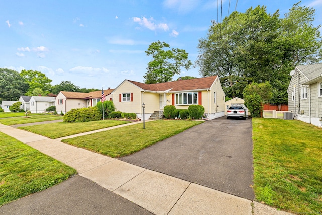 128 Auburn St, Stratford, CT 06614 - view of front of property featuring driveway and a residential view