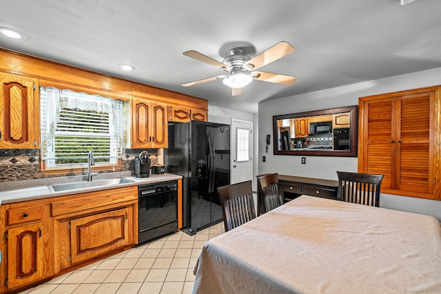 128 Auburn St, Stratford, CT 06614 - kitchen featuring black appliances, light tile patterned flooring, decorative backsplash, plenty of natural light, and recessed lighting
