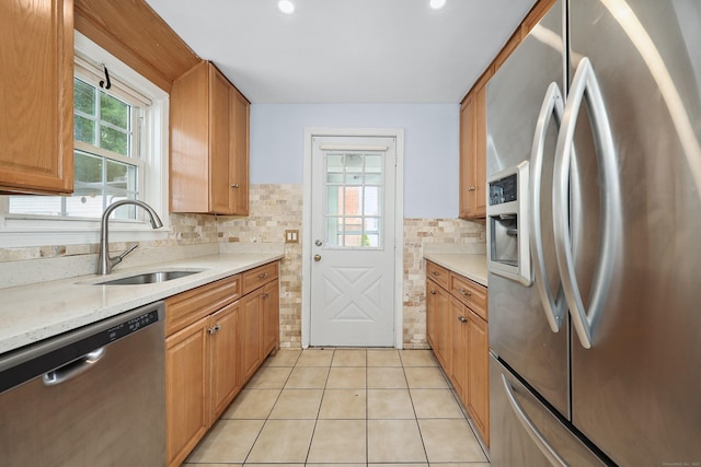 35 Oberlin Rd, Hamden, CT 06514 - kitchen featuring appliances with stainless steel finishes, backsplash, light tile patterned floors, and recessed lighting