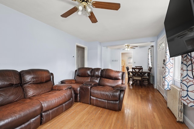35 Oberlin Rd, Hamden, CT 06514 - living room with a ceiling fan and light wood-style floors