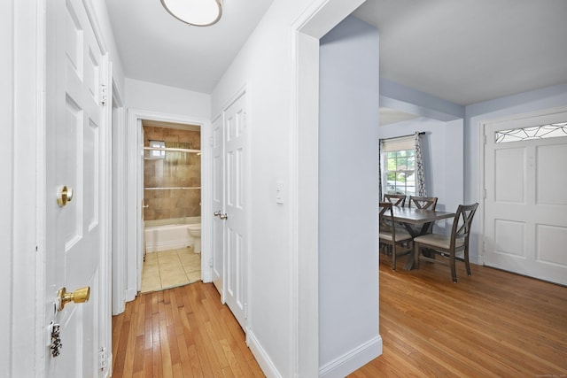35 Oberlin Rd, Hamden, CT 06514 - corridor featuring light wood-type flooring and baseboards