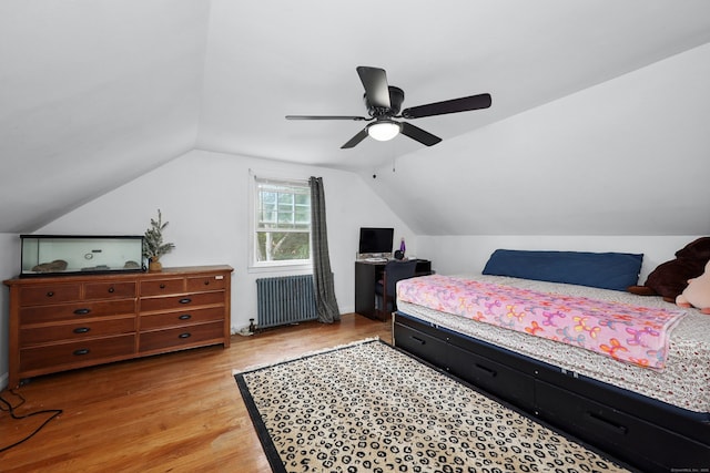 35 Oberlin Rd, Hamden, CT 06514 - bedroom with radiator, light wood finished floors, vaulted ceiling, and ceiling fan