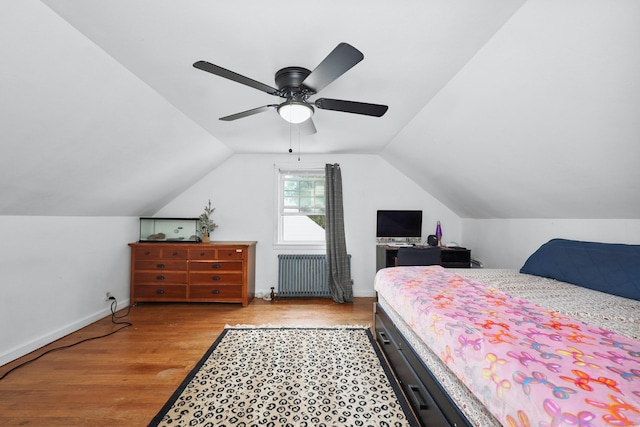 35 Oberlin Rd, Hamden, CT 06514 - bedroom with radiator heating unit, light wood finished floors, vaulted ceiling, and a ceiling fan