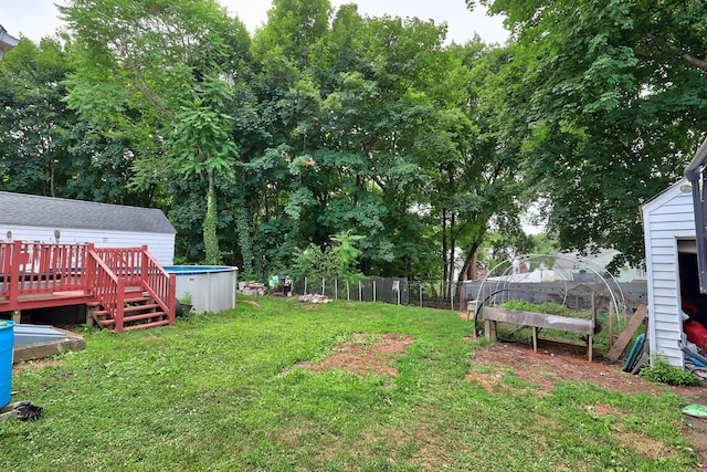 35 Oberlin Rd, Hamden, CT 06514 - view of yard featuring a deck and an outdoor pool