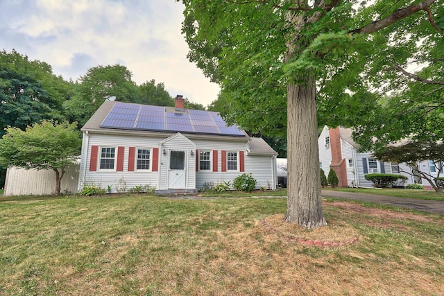 35 Oberlin Rd, Hamden, CT 06514 - view of front of property featuring solar panels and a chimney