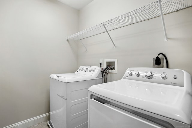 142 E Ave Unit A302, Norwalk, CT 06851 - washroom featuring washer and dryer and baseboards