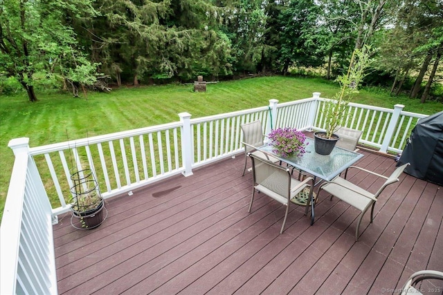129 Russell Ave, Orange, CT 06477 - wooden deck with outdoor dining space, a lawn, and area for grilling