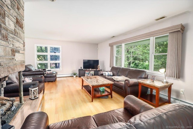 129 Russell Ave, Orange, CT 06477 - living area with healthy amount of natural light and wood finished floors