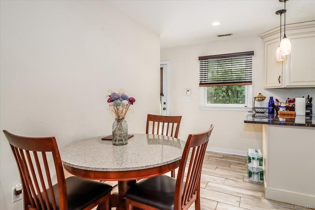 129 Russell Ave, Orange, CT 06477 - dining room with light wood finished floors and recessed lighting