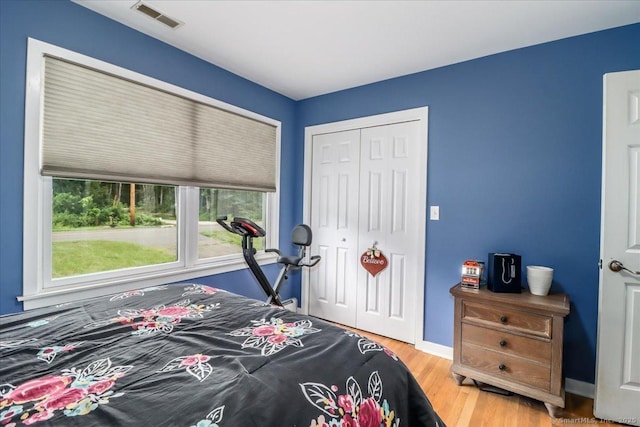 129 Russell Ave, Orange, CT 06477 - bedroom featuring a closet and wood finished floors
