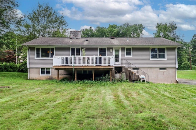 129 Russell Ave, Orange, CT 06477 - rear view of property featuring a deck, a lawn, and a chimney