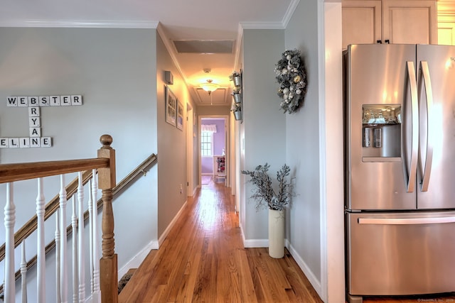 662 Booth Hill Rd, Trumbull, CT 06611 - corridor featuring attic access, light wood finished floors, ornamental molding, and an upstairs landing