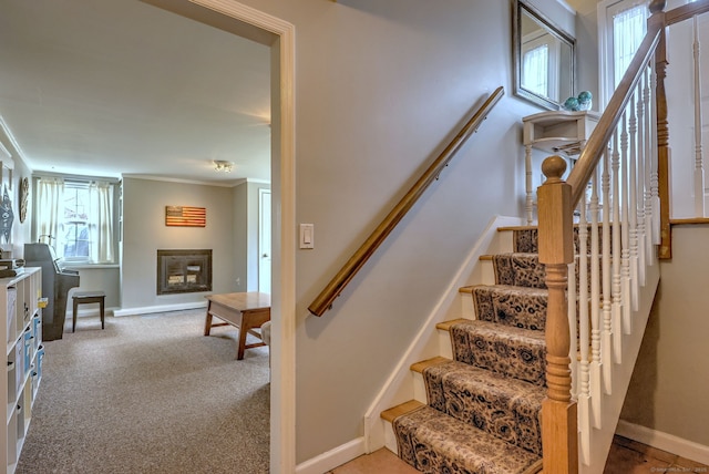 662 Booth Hill Rd, Trumbull, CT 06611 - staircase featuring healthy amount of natural light, a glass covered fireplace, and carpet flooring