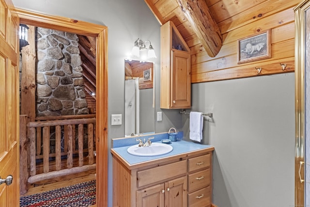 187 Chaplin Rd, Eastford, CT 06242 - bathroom featuring vanity and a wooden ceiling with exposed beams
