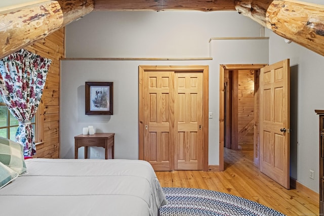 187 Chaplin Rd, Eastford, CT 06242 - bedroom with light wood-style flooring, a closet, and vaulted ceiling