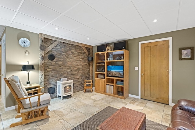 187 Chaplin Rd, Eastford, CT 06242 - living area with a wood stove, a drop ceiling, and recessed lighting