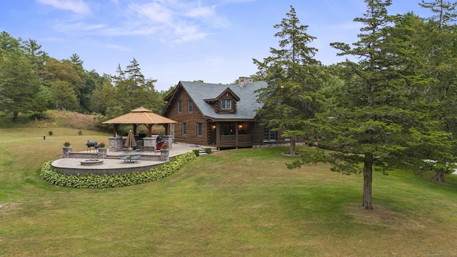187 Chaplin Rd, Eastford, CT 06242 - rear view of house with a gazebo, log exterior, a lawn, and a patio