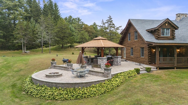 187 Chaplin Rd, Eastford, CT 06242 - view of green lawn featuring an outdoor fire pit, a gazebo, and a patio area