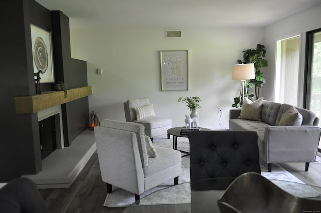 25 Heritage Dr Unit 25, Avon, CT 06001 - living room featuring wood finished floors and a fireplace with raised hearth